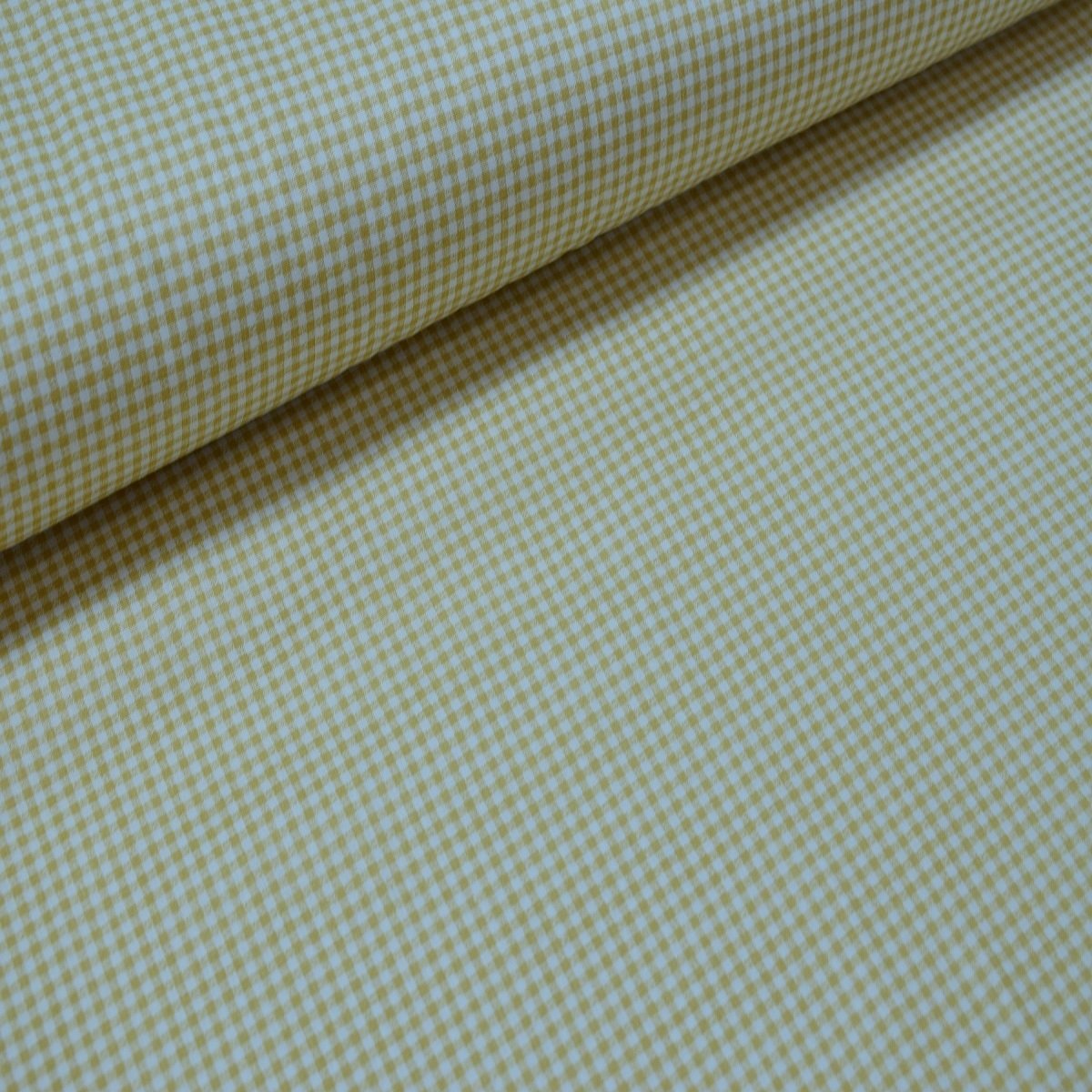 Un tissu de popeline beige pitikar