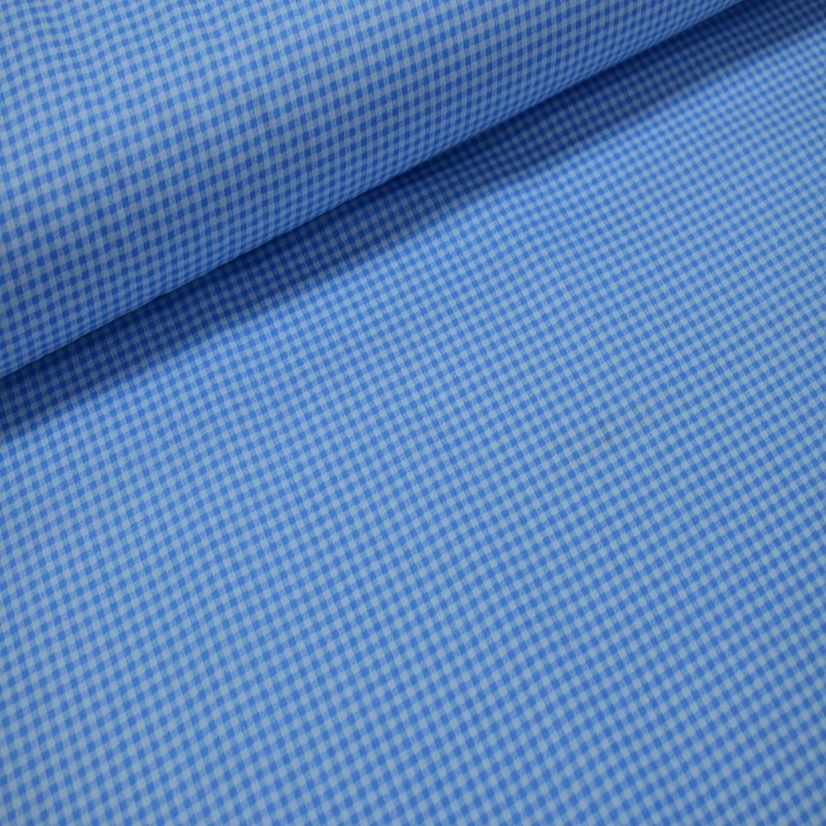 Un tissu de popeline bleu pitikar